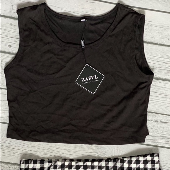 Two piece outfit. Checked skirt and black crop top - Picture 2 of 3